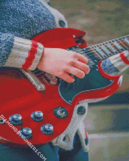 person playing electric guitar diamond paintings