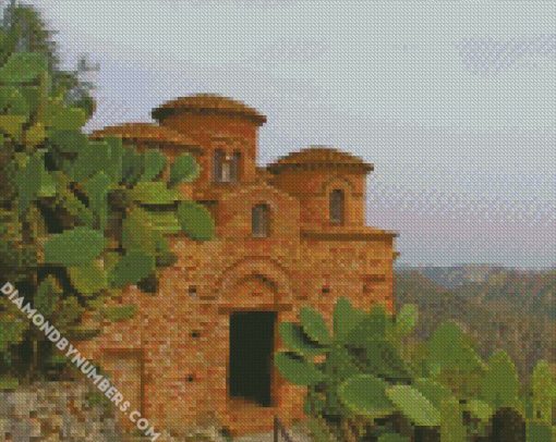 concrete building during daytime With cactus plant diamond painting